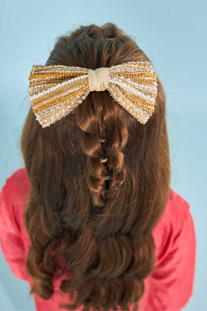 Gold taylor bow